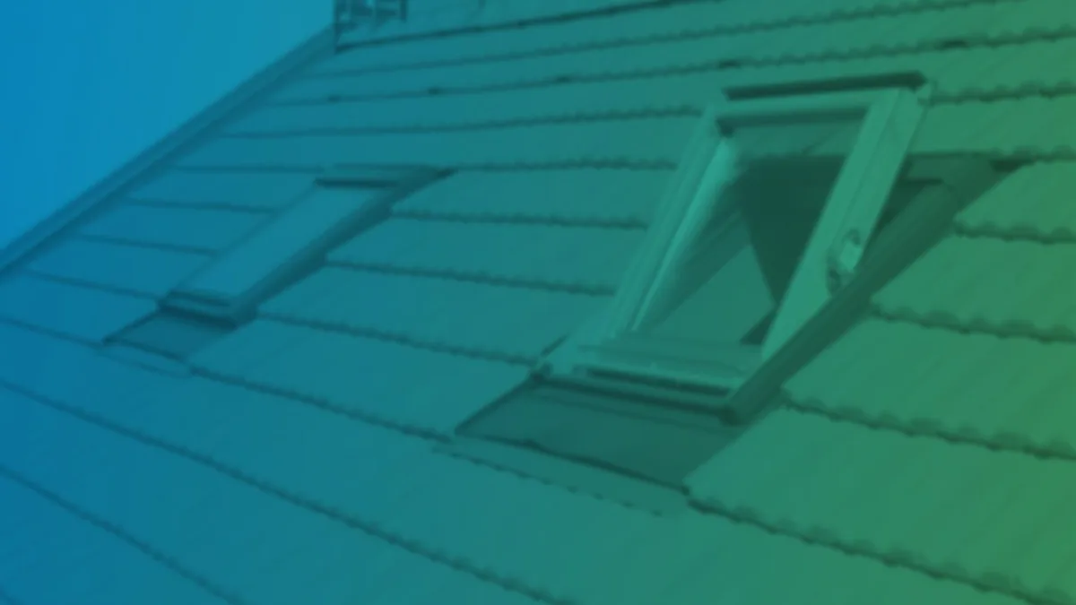 Fenêtres de toit Velux posées dans des combles aménagés par ECOTOIT
